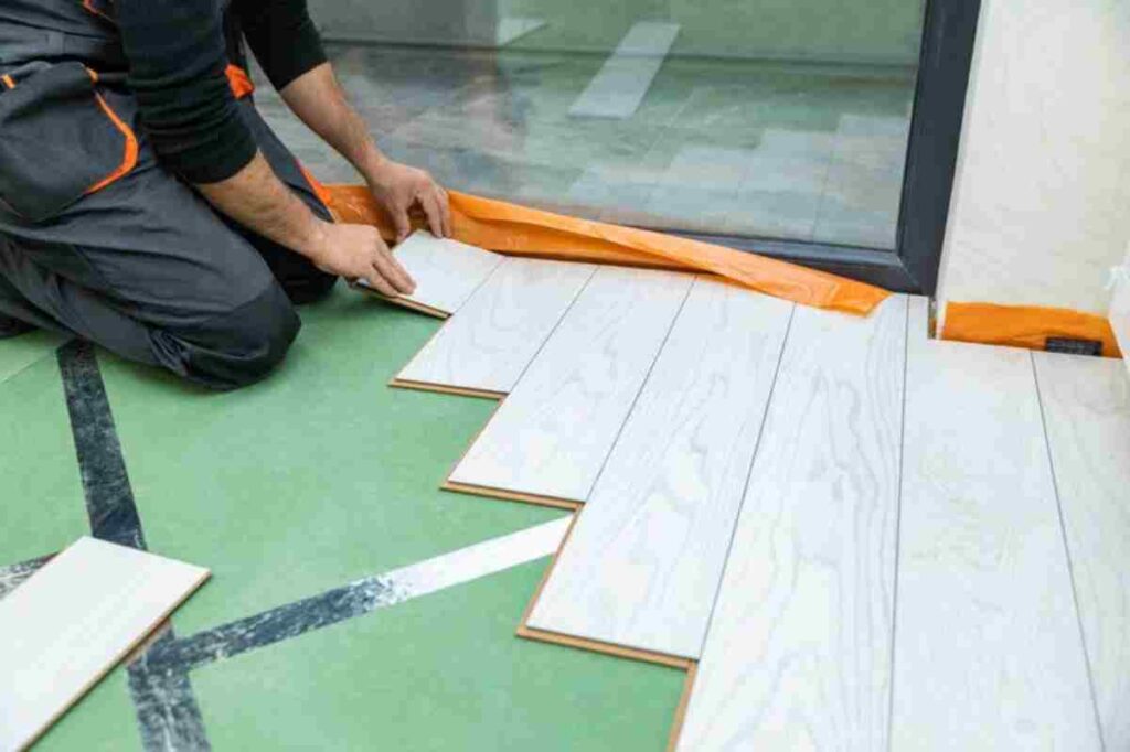 Expert installing flooring and inspecting an office roof.